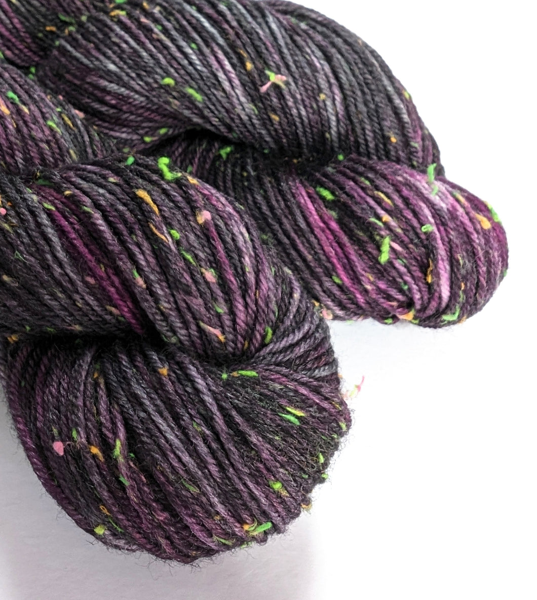 Black Raspberry on superwash merino with neon neps - DK.