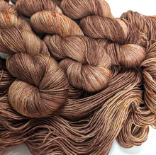 Load image into Gallery viewer, Speckled brown, on baby camel/silk 4ply/fingering weight yarn.
