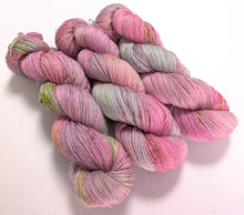 Load image into Gallery viewer, Speckled pinks on superwash merino/bamboo 4ply/fingering weight.
