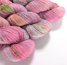 Load image into Gallery viewer, Speckled pinks on superwash merino/bamboo 4ply/fingering weight.
