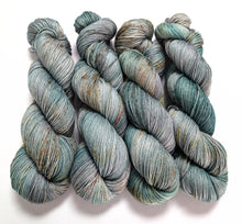 Load image into Gallery viewer, Speckled greens on superwash merino/bamboo 4ply/fingering weight.
