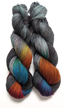 Load image into Gallery viewer, Dark Winter Rainbow on superwash BFL/nylon sock yarn.
