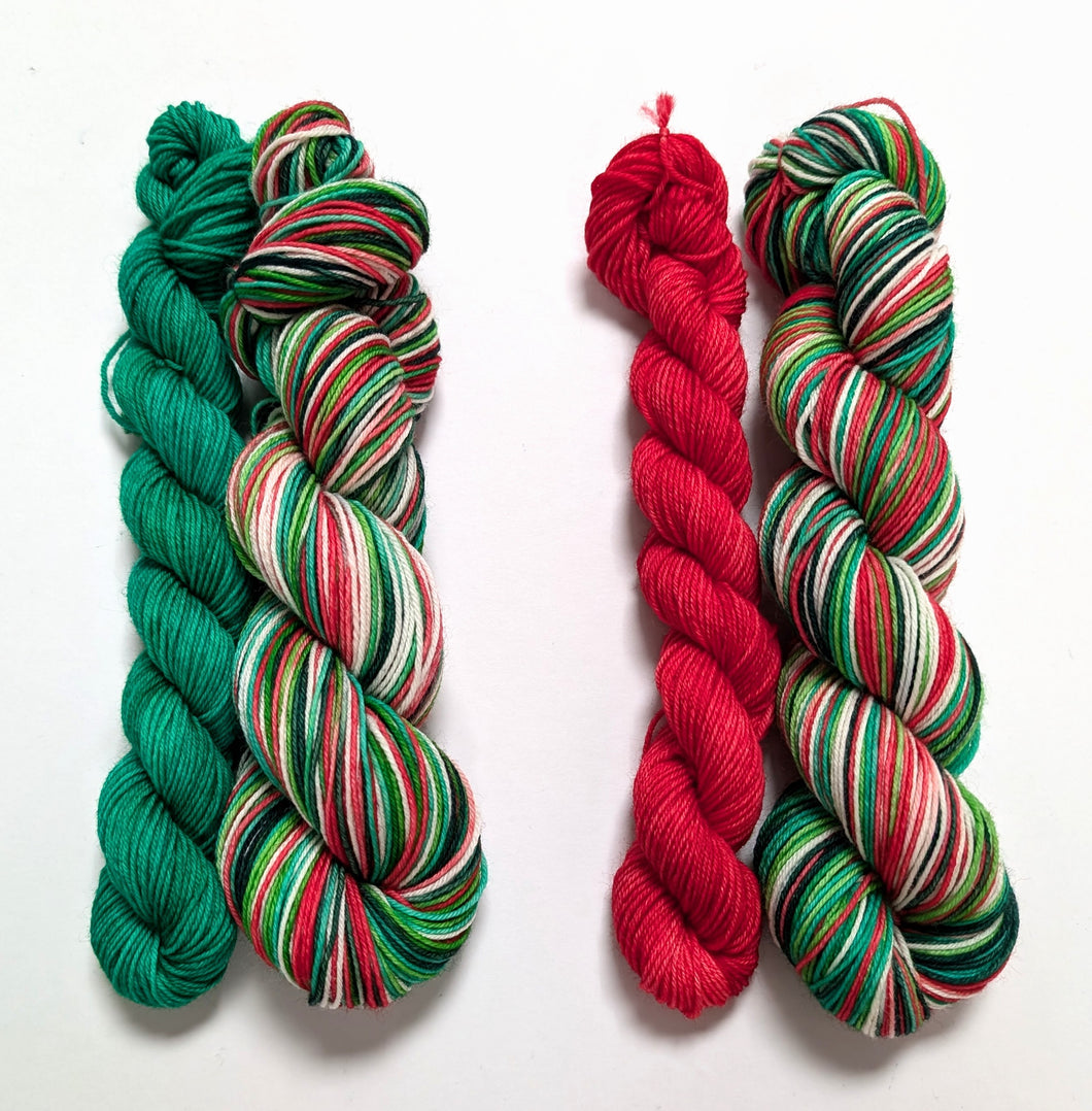 Holly Jolly Christmas sock set, on superwash merino/nylon sock yarn.