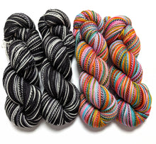 Load image into Gallery viewer, Jack &amp; Sally on superwash merino/nylon &#39;zebra&#39; sock.
