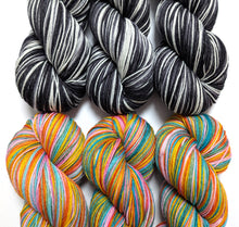 Load image into Gallery viewer, Jack &amp; Sally on superwash merino/nylon sock.
