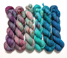 Load image into Gallery viewer, Multi coloured gradient yarn set on superwash merino/nylon/sparkle sock yarn.
