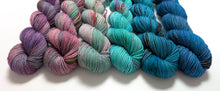 Load image into Gallery viewer, Multi coloured gradient yarn set on superwash merino/nylon/sparkle sock yarn.
