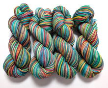 Load image into Gallery viewer, Bare Necessities, hand dyed on a superwash merino/nylon sock yarn.
