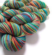 Load image into Gallery viewer, Bare Necessities, hand dyed on a superwash merino/nylon sock yarn.
