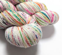 Load image into Gallery viewer, Advent Speckles on a Superwash Merino/Nylon/Sparkle sock yarn.
