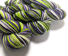 Load image into Gallery viewer, Beetlejuice on Talamh sock yarn.
