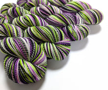 Load image into Gallery viewer, Beetlejuice on high twist superwash merino/nylon &quot;Zebra&quot; sock yarn.
