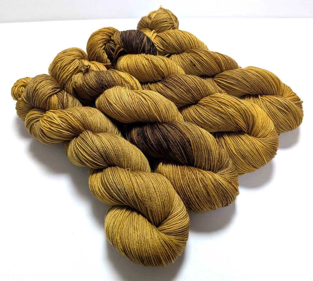 Old Gold on superwash BFL/nylon sock yarn.