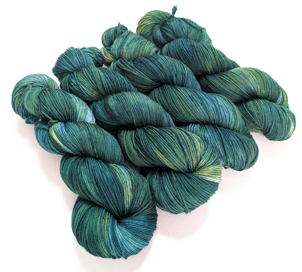 Fir on superwash merino/cashmere/nylon sock yarn.