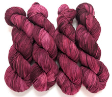 Load image into Gallery viewer, Redplant on superwash merino/cashmere/nylon sock yarn.
